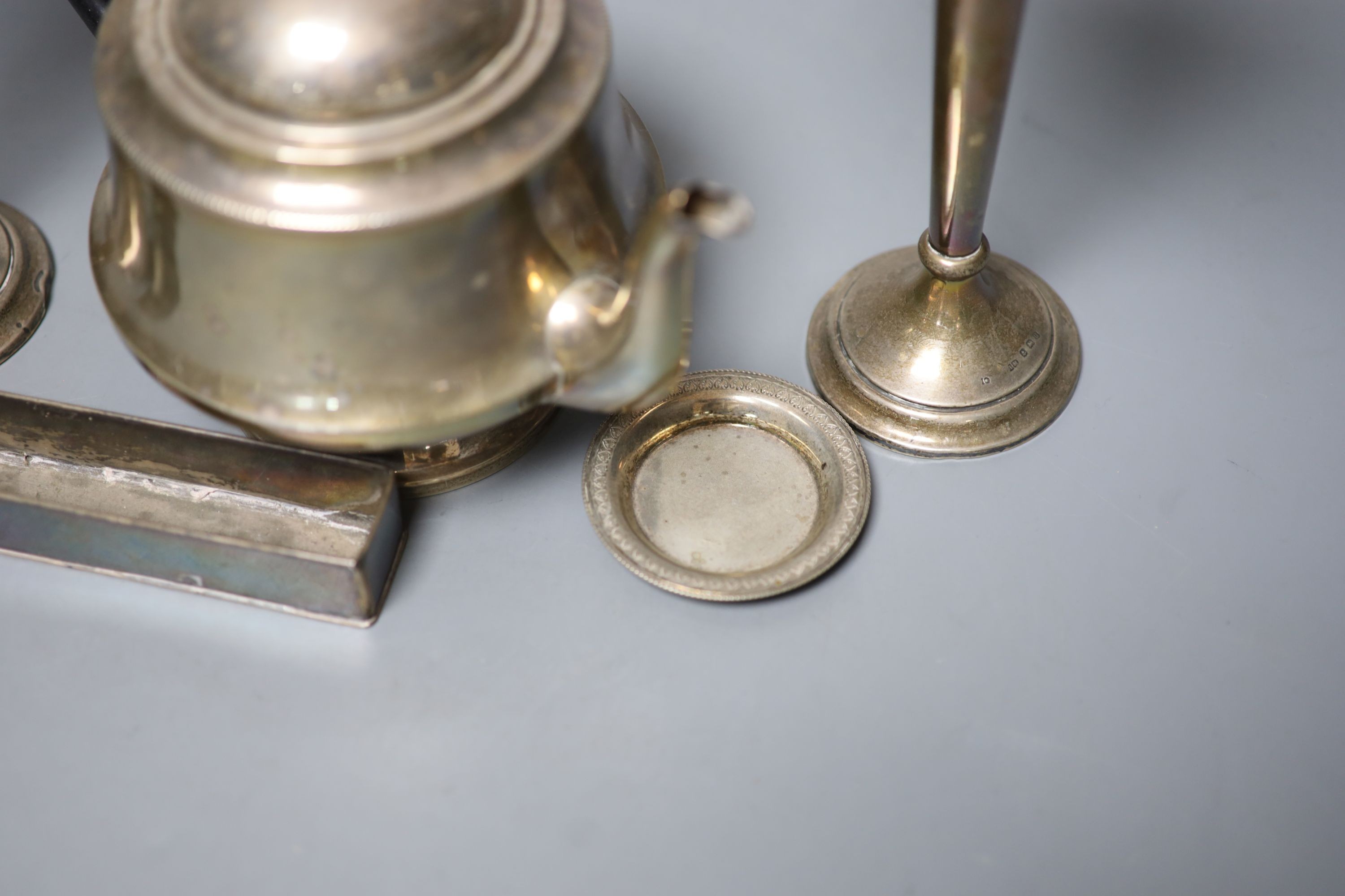 A 1930's silver teapot, a pair of silver mounted posy vases(a.f.), an Egyptian white metal small dish and a metal trough, weighable silver gross 11oz.